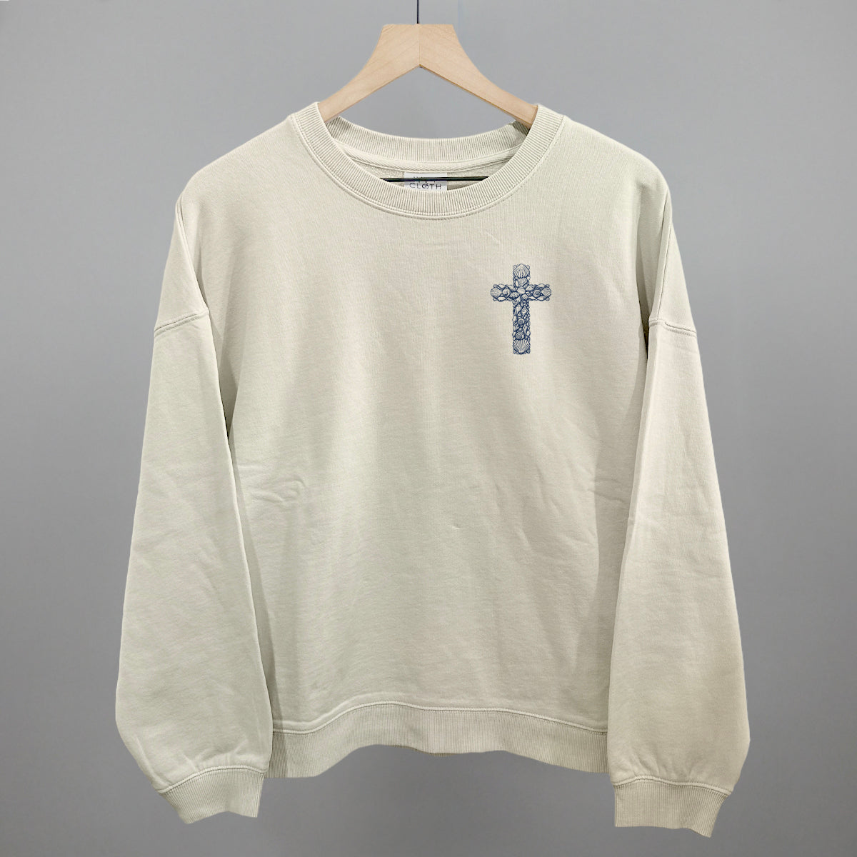 Seashell Cross (Left Chest)
